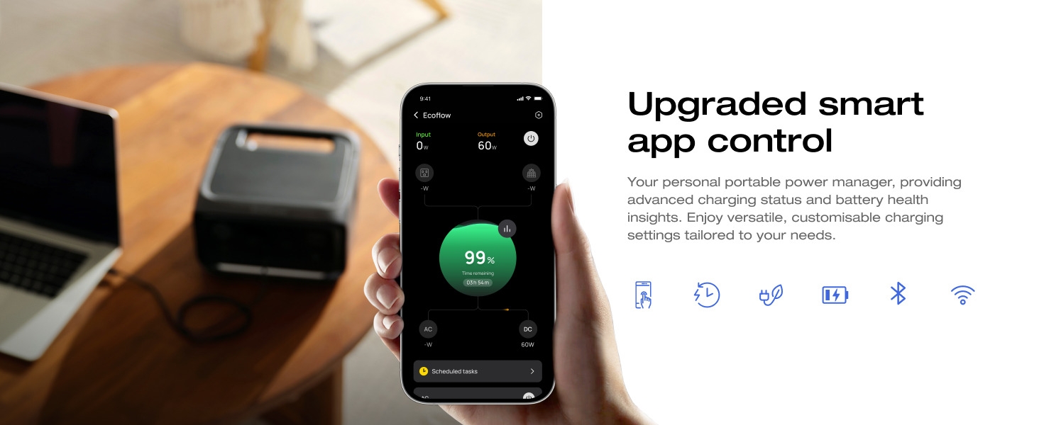 Smartphone displaying smart app control interface with power usage statistics and device controls next to a small black device.