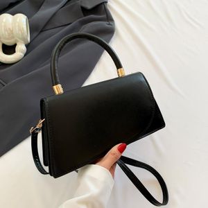 Black Flap Top Handle Crossbody Bag