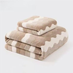 Two piece set of absorbent soft towels and bath towels - brown