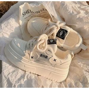 White "LAL" chunky sneakers feature thick platform soles and "RI" branding on the tongue.