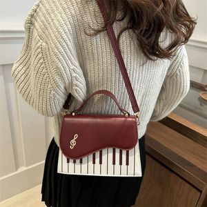 GALUIN Creative piano pattern women's crossbody bag, can be carried by hand