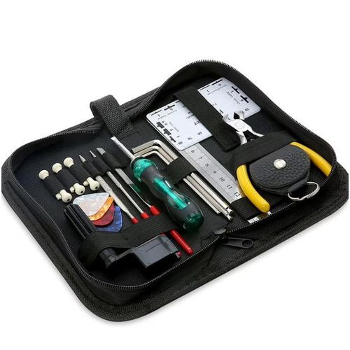 Generic Guitar maintenance and repair tool kit, including cleaning and care tools, a string winder, and measuring gauges. - image 7